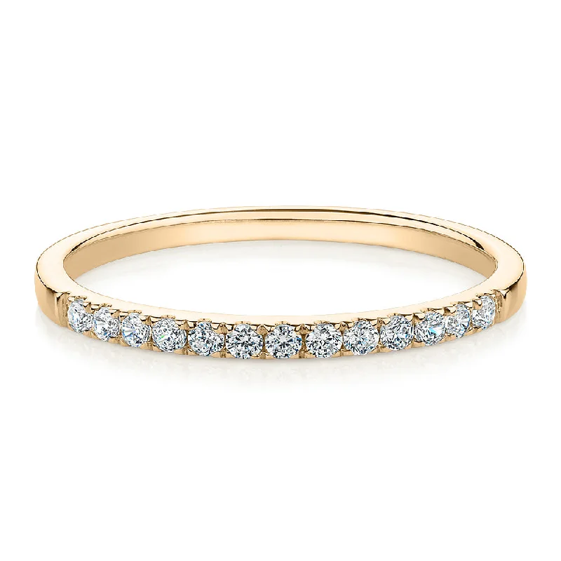 Wedding or eternity band in 14 carat yellow gold