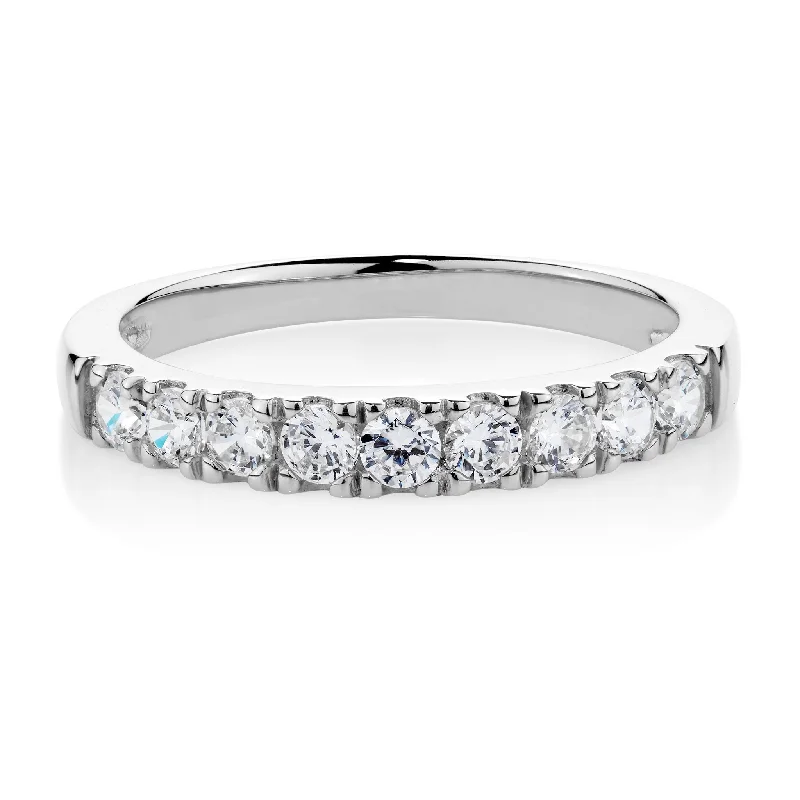 Wedding or eternity band with 0.54 carats* of diamond simulants in 14 carat white gold