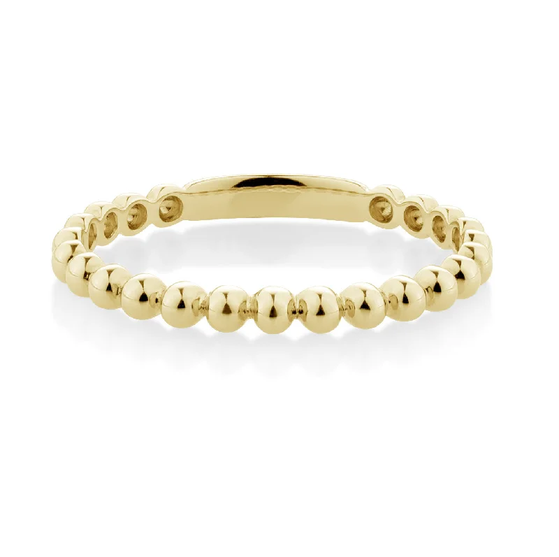 Wedding or eternity band in 10 carat yellow gold