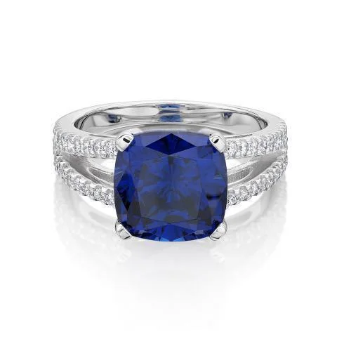 Dress ring with 10x10mm tanzanite simulant and 0.4 carats* of diamond simulants in 10 carat white gold