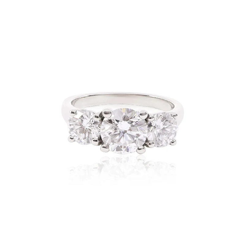 ESTATE THREE-STONE ROUND BRILLIANT DIAMOND ENGAGEMENT RING WITH A 1.27CT CENTER AND 1.10CT SIDE DIAMONDS