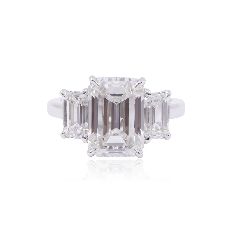 PLATINUM EMERALD-CUT DIAMOND THREE-STONE ENGAGEMENT RING WITH A 5.18CT CENTER