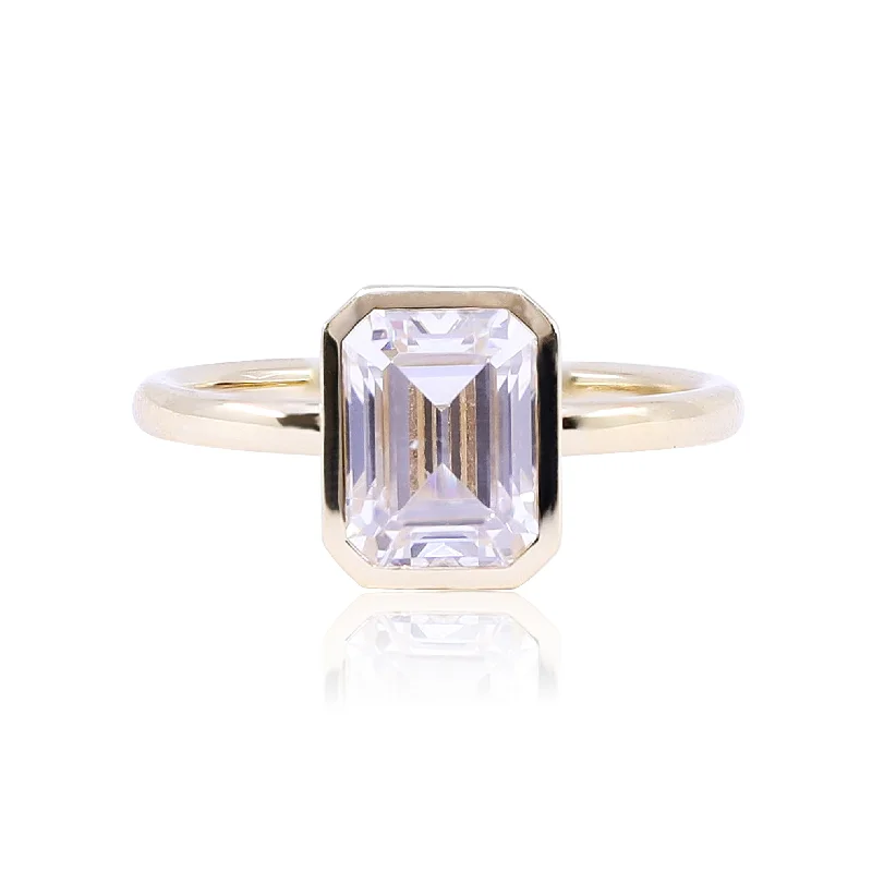 18K YELLOW GOLD BEZEL-SET EMERALD-CUT SOLITAIRE ENGAGEMENT RING WITH HIDDEN DIAMOND HALO (SETTING ONLY)