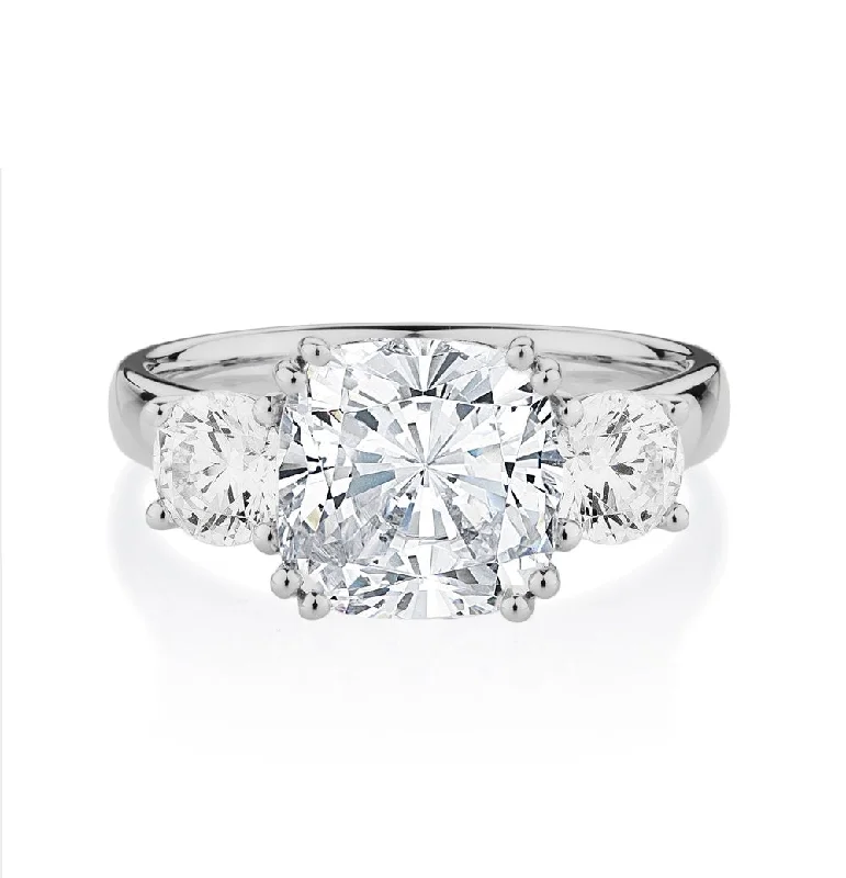 Three stone ring with 3.75 carats* of diamond simulants in 10 carat white gold