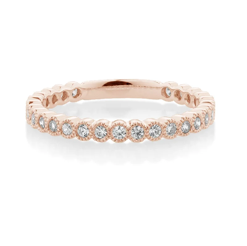 Wedding or eternity band with 0.4 carats* of diamond simulants in 10 carat rose gold