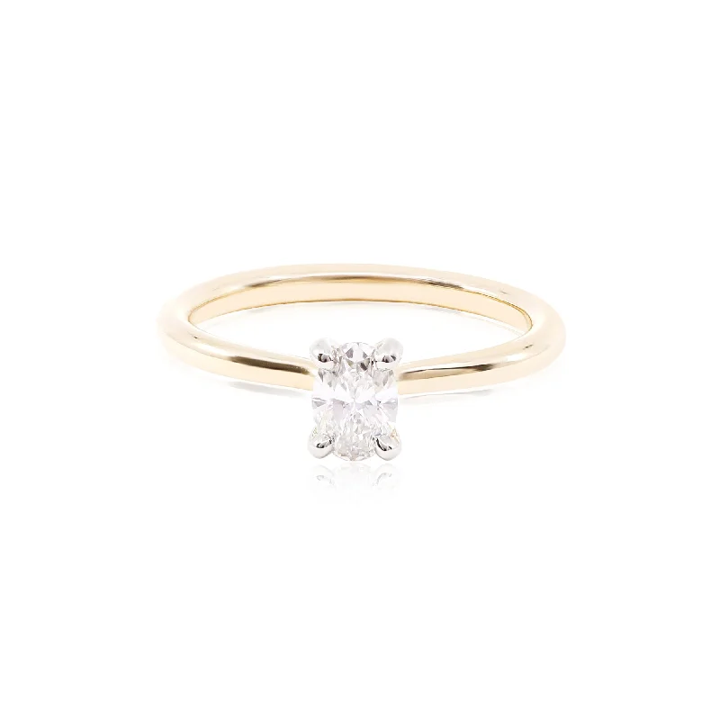 14K YELLOW GOLD NEW AIRE SOLITAIRE ENGAGEMENT RING WITH A 0.41CT OVAL CENTER DIAMOND