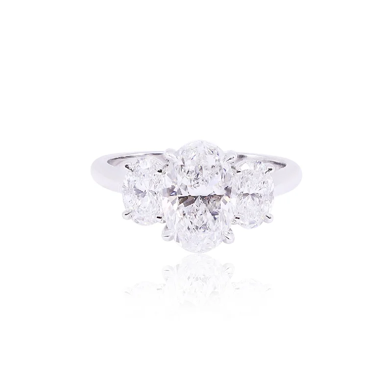 PLATINUM HENNE FIT THREE-STONE OVAL DIAMOND ENGAGMENT RING WITH A 2.30CT CENTER