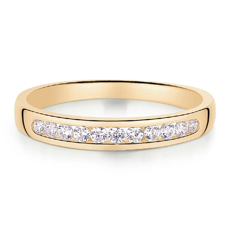 Wedding or eternity band in 14 carat yellow gold