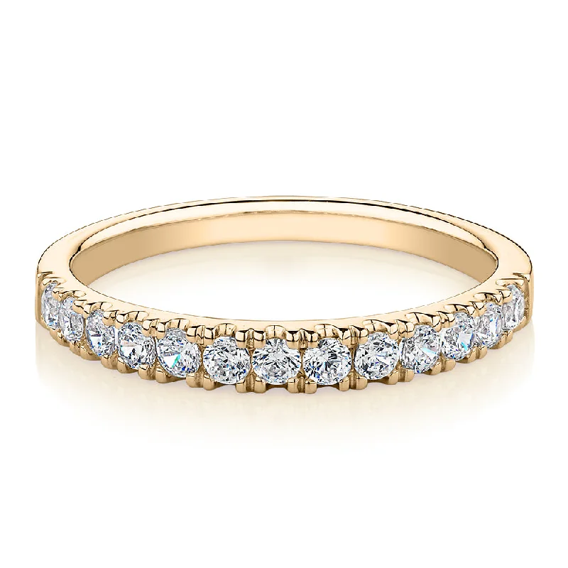 Wedding or eternity band with 0.39 carats* of diamond simulants in 10 carat yellow gold