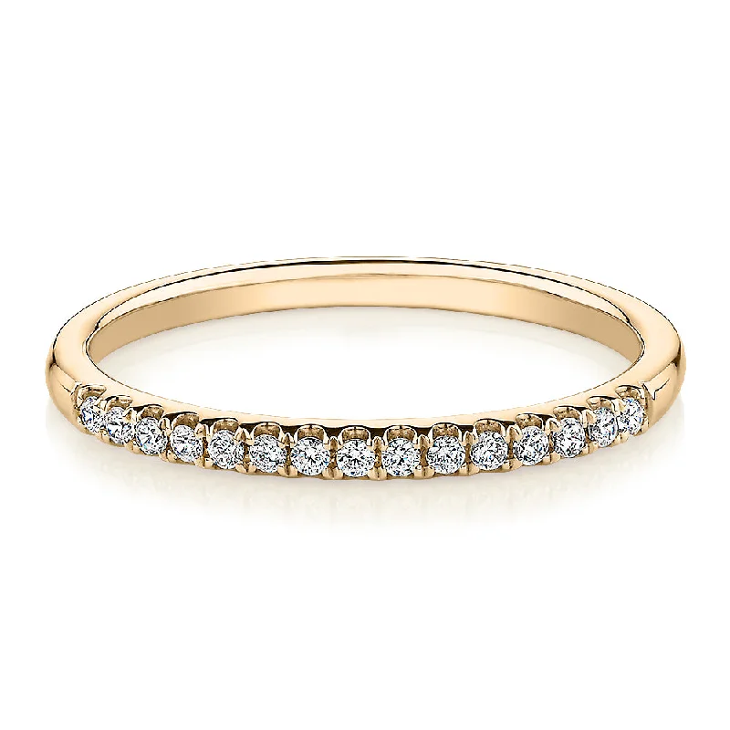 Wedding or eternity band in 14 carat yellow gold