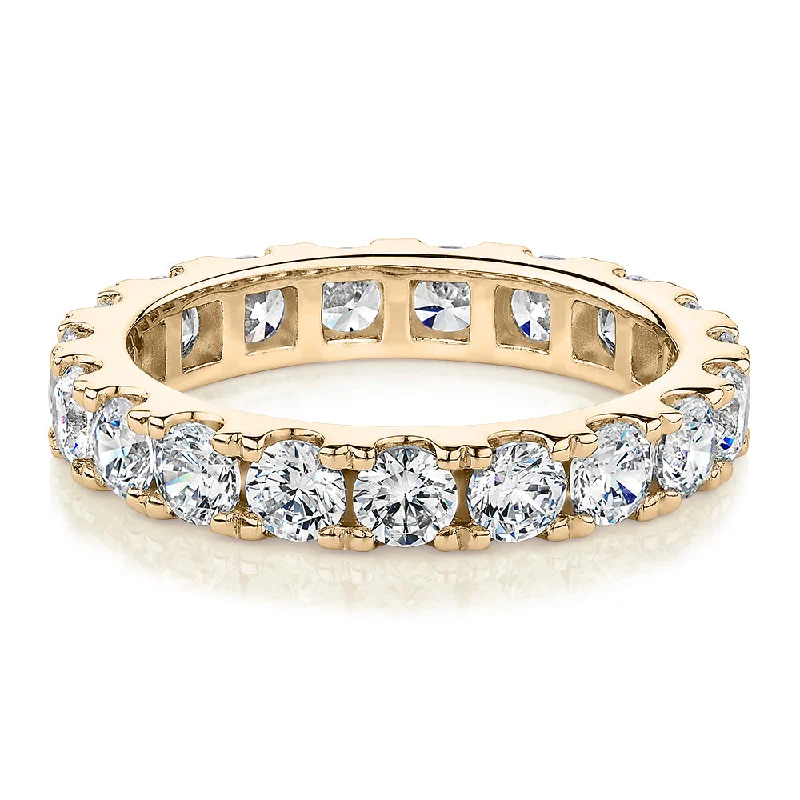 All-rounder eternity band with 2.09 carats* of diamond simulants in 14 carat yellow gold