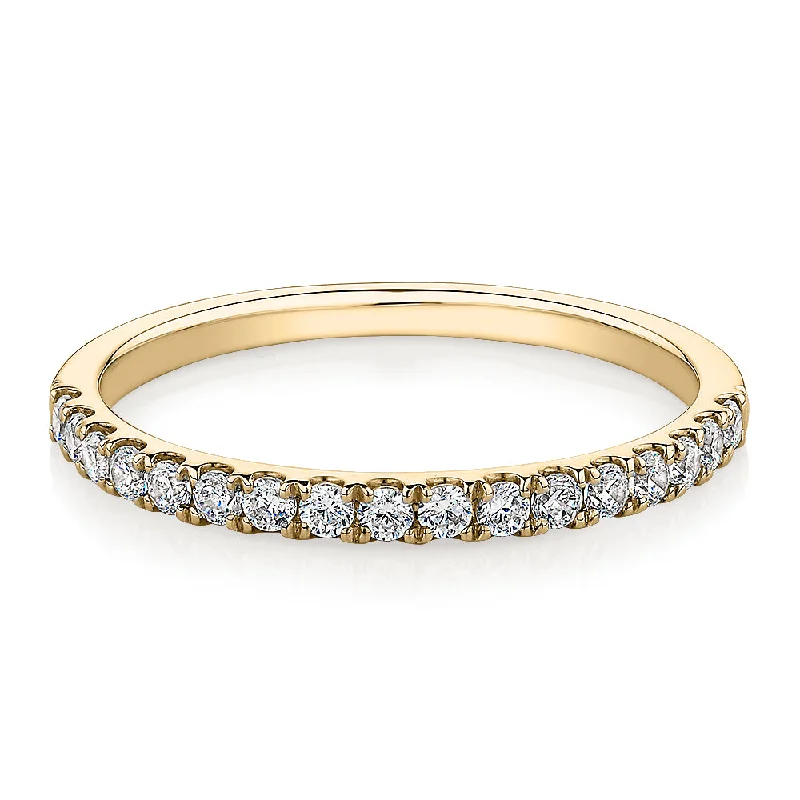 Wedding or eternity band with 0.25 carats* of diamond simulants in 10 carat yellow gold