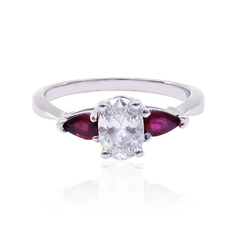 ESTATE 14K WHITE GOLD OVAL DIAMOND AND PEAR-SHAPE RUBY THREE-STONE RING