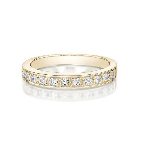 Wedding or eternity band in 14 carat yellow gold